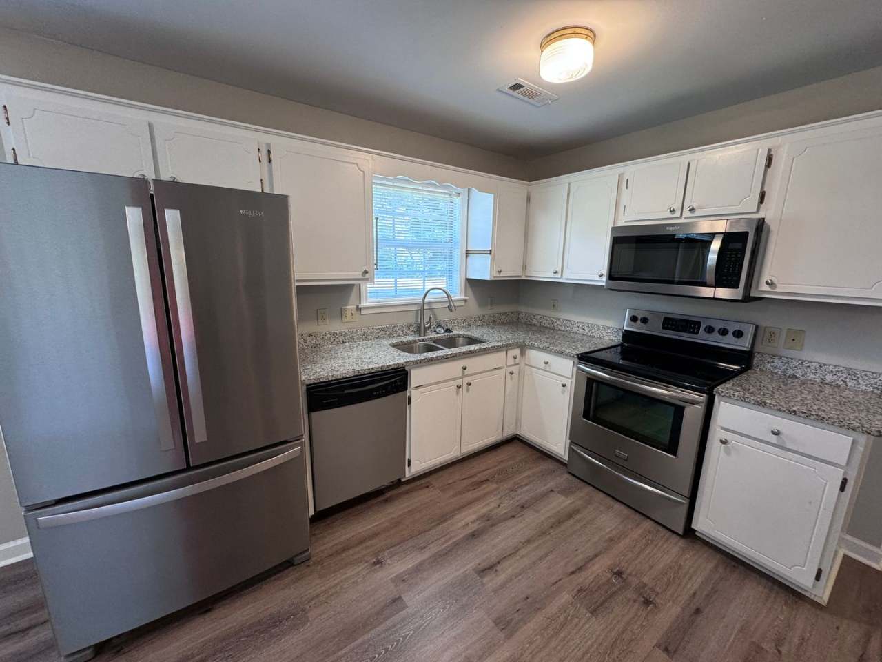 Quiet 3/2 Home with attached garage and fenced yard