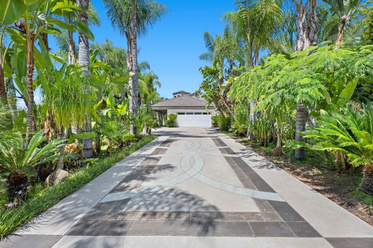 Beautiful Custom Built, Two-Story Home on Stunningly Landscaped Property with Gated Entrance!