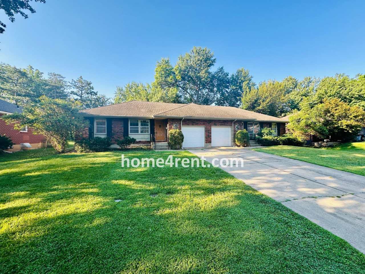 Charming Duplex Style Home with New Paint, Updated Floors, Finished Basement and a Quiet Back Patio!