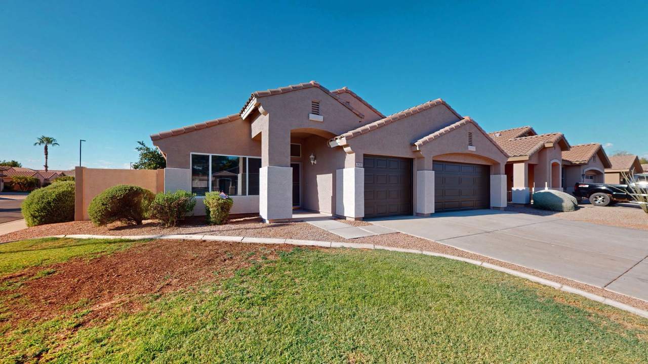 REMODELED single level home with 3 car garage and a SPARKLING swimming pool!