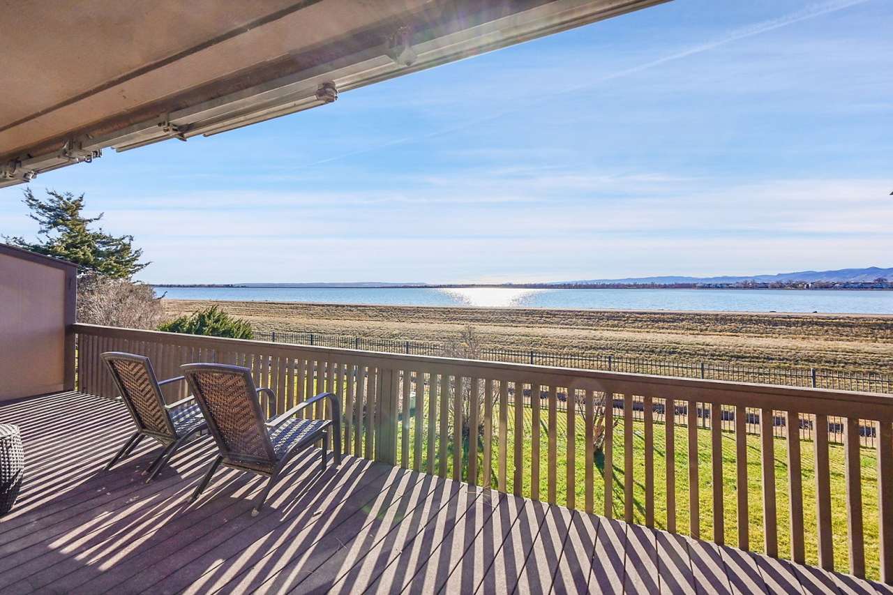 Backs to private lake with mountain views