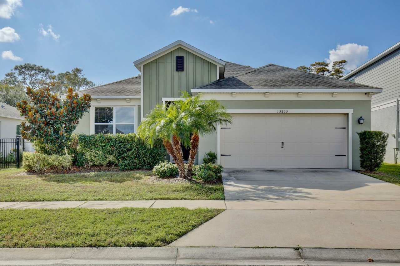 Gorgeous 4/3 Spacious Home with a 2 Car Garage Located on a Conservation Lot in Creekstone Neighborhood – Orlando!