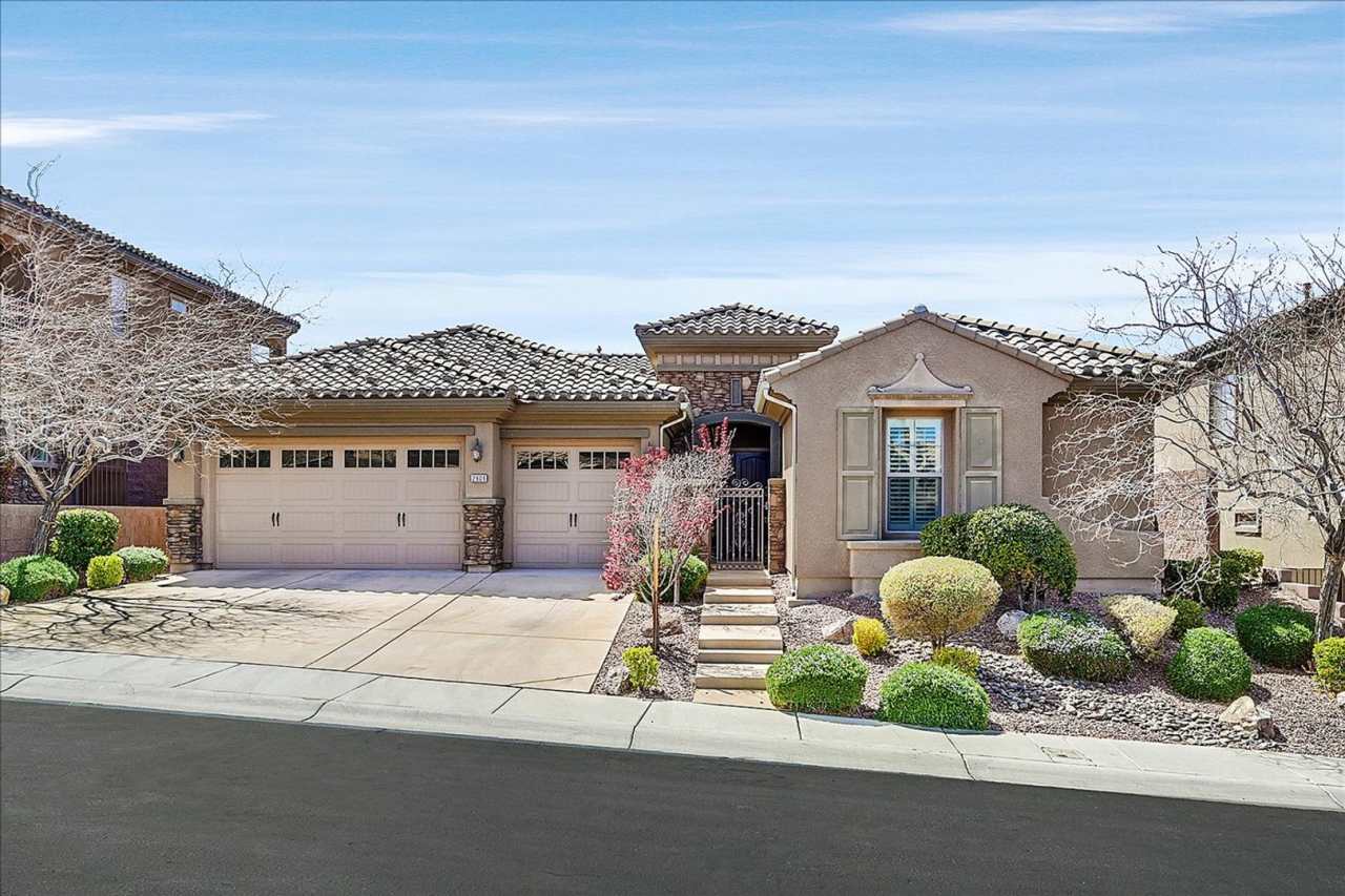 Stunning 1-story home in the prestigious Club at Madeira Canyon guard gated community!