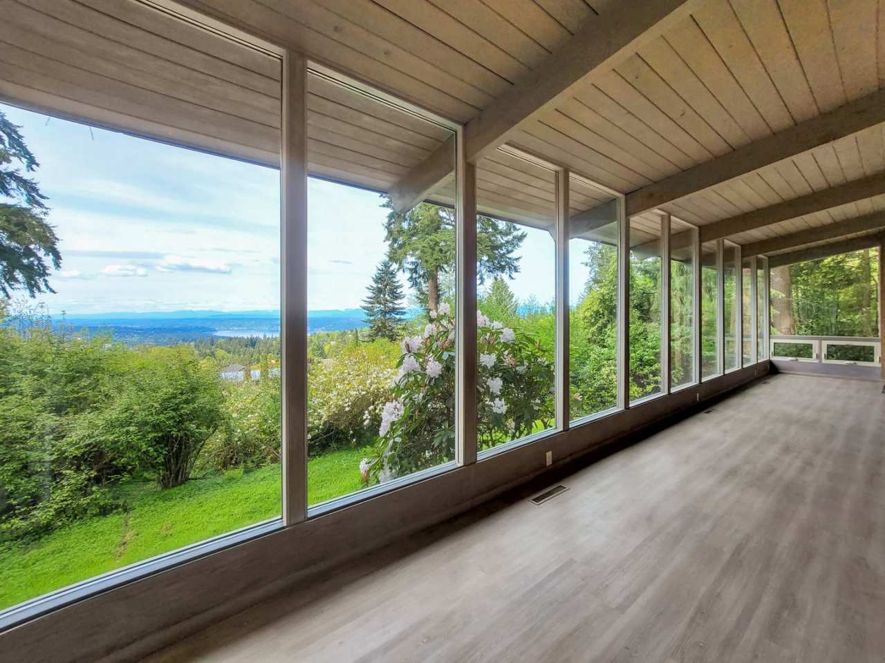 Vintage architectural home looking over Seattle and Bellevue metropolitan skyline.