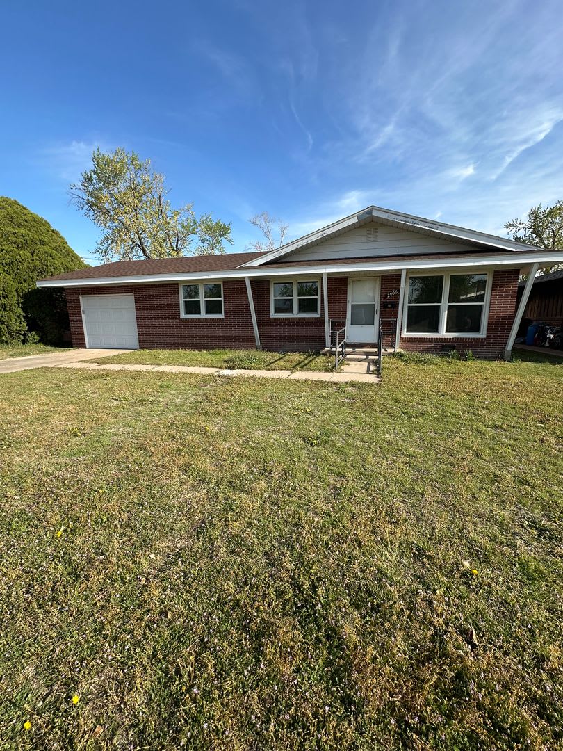 4 Bedroom, 2 Bathroom House with Attached Garage