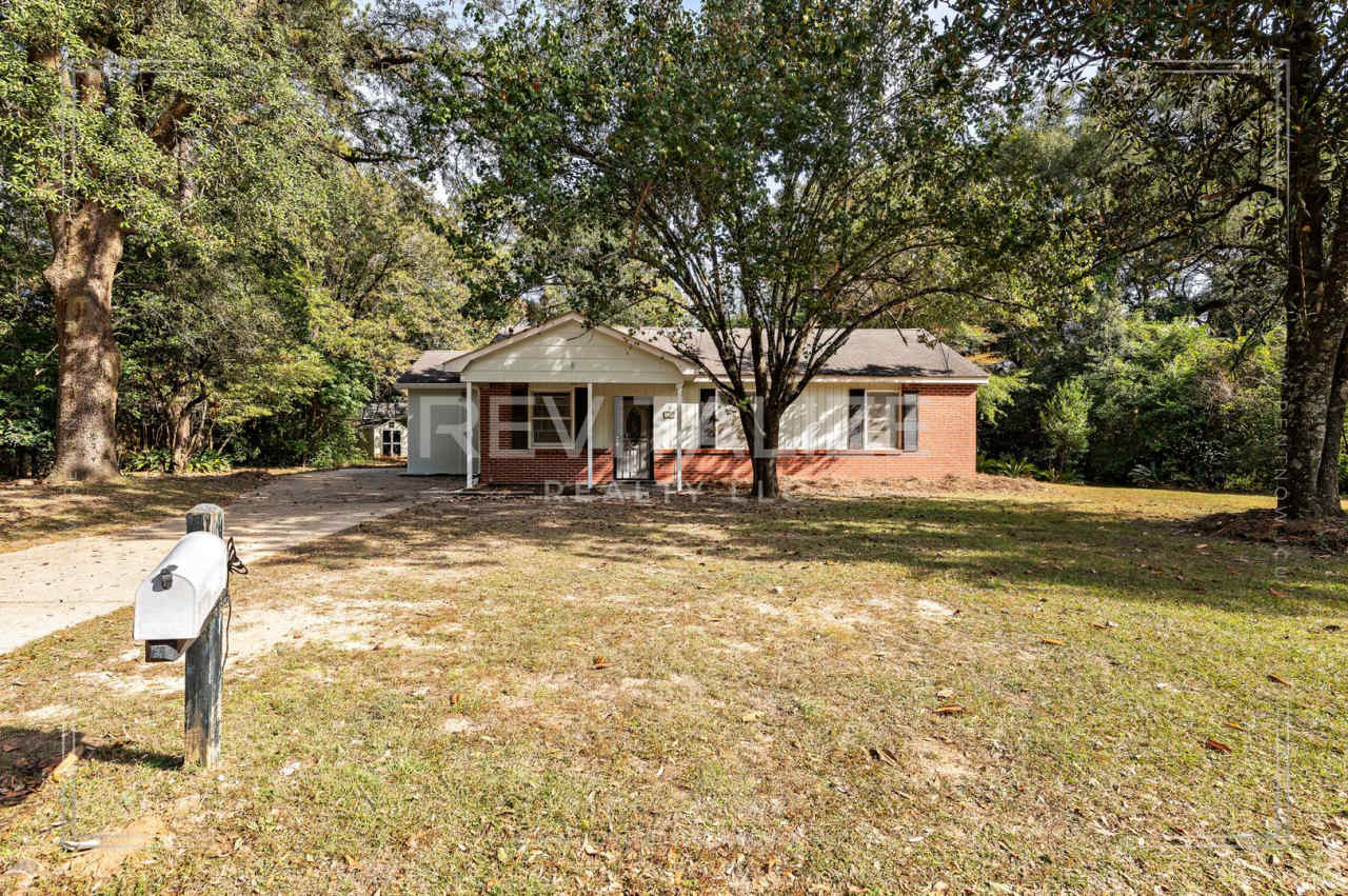 Updated Brick 3 Bed 1 Bath Home with Huge Yard on Quiet Street!