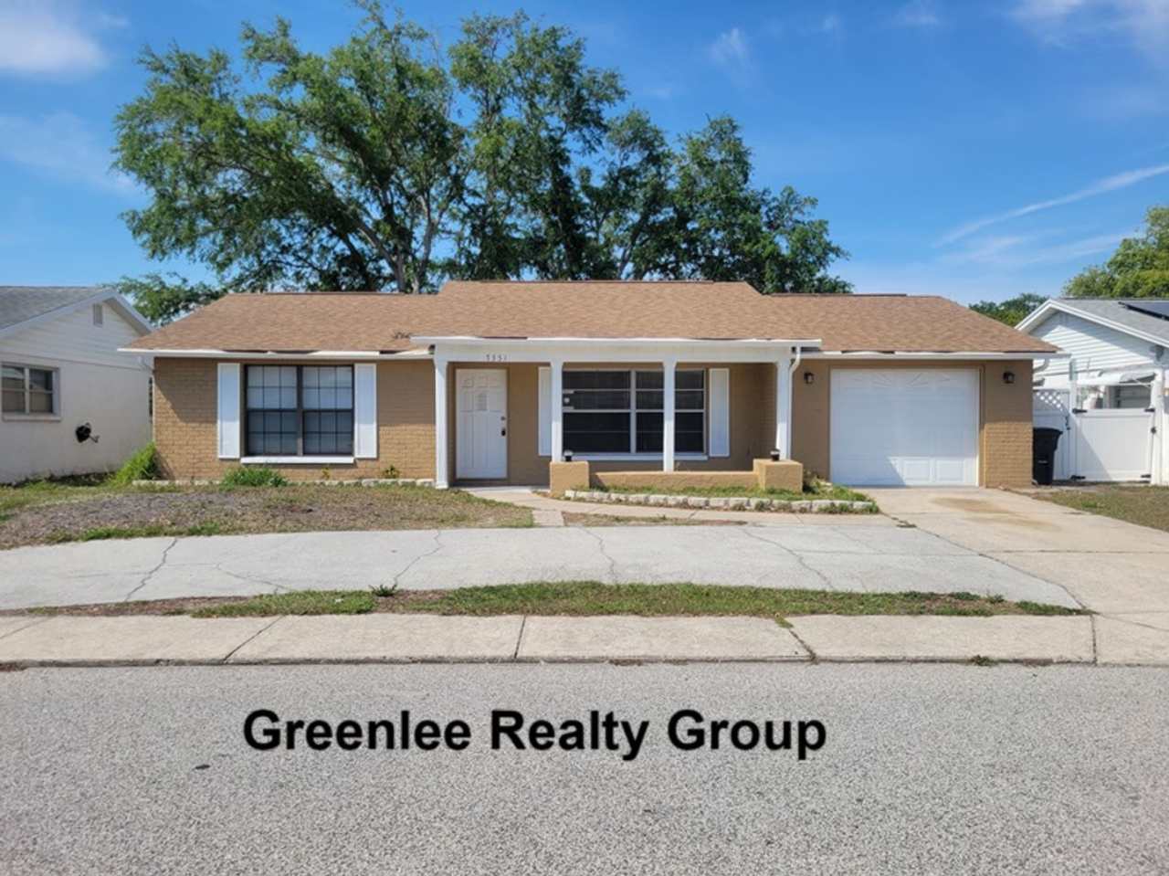 Charming  Spacious 4-Bedroom, 2-Bath Home with a Large Screened Porch!