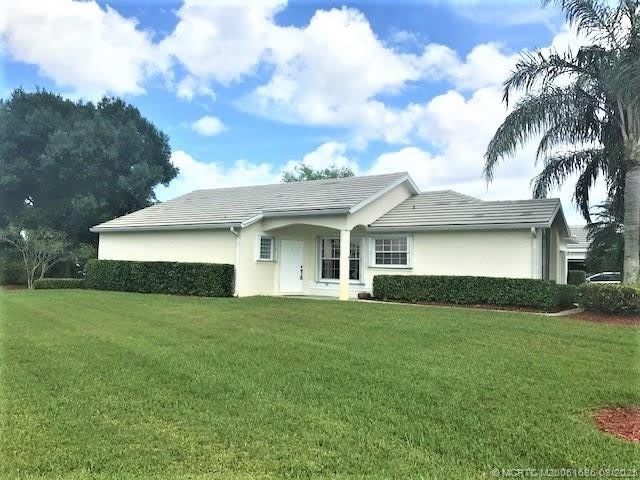 3486 SW Pindo Palm Lane