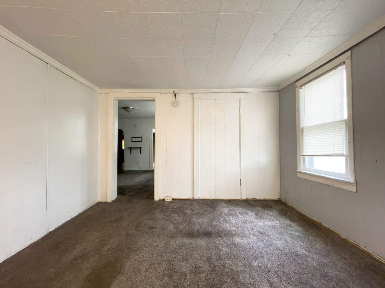 Fall into this cozy 3-Bedroom Home with a fenced in yard  detached garage!