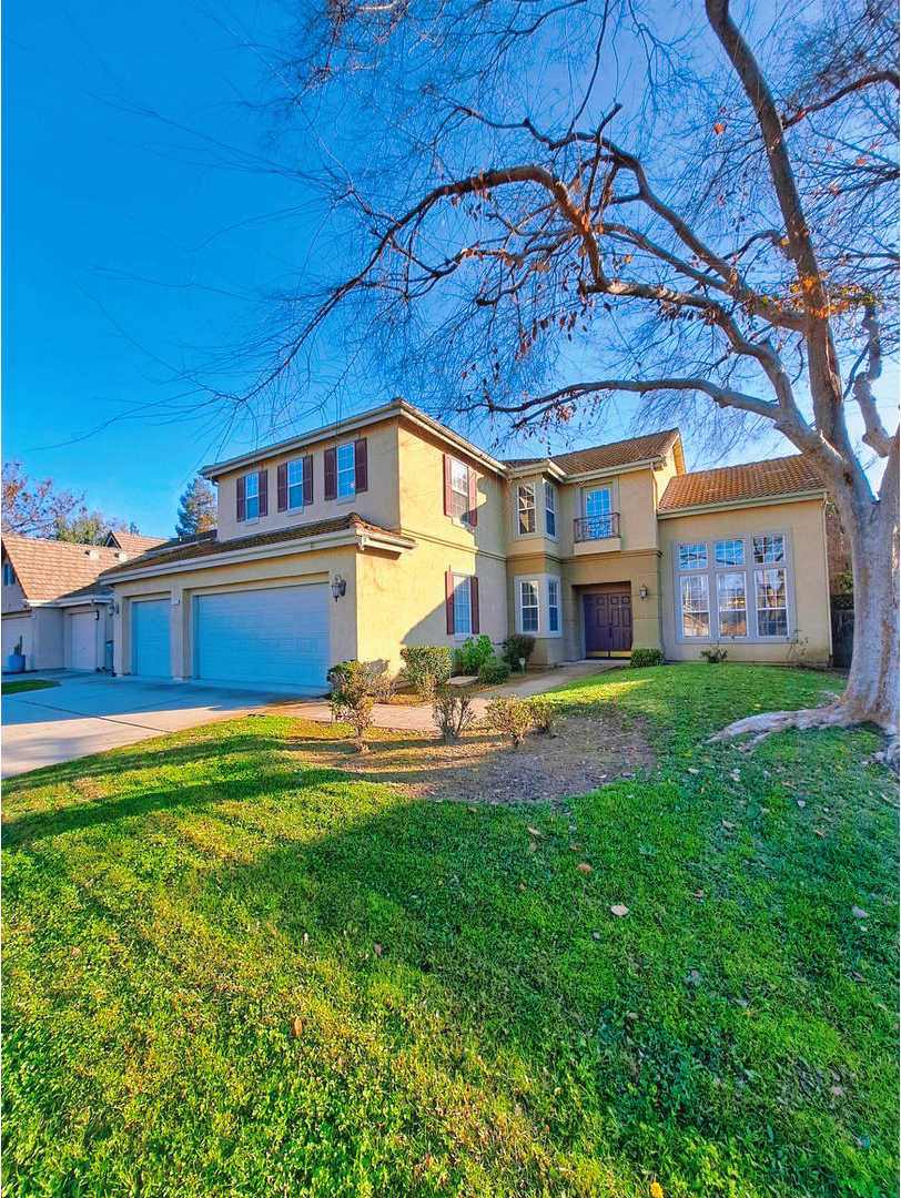 Spacious 5-Bedroom Fresno Home with Garage and Backyard!