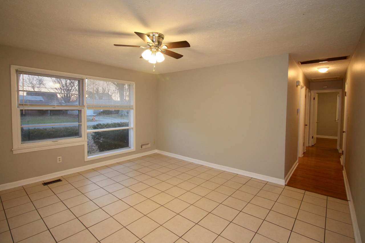 Adorable 3-brm brick ranch with lots of natural light, family room/den, attached garage