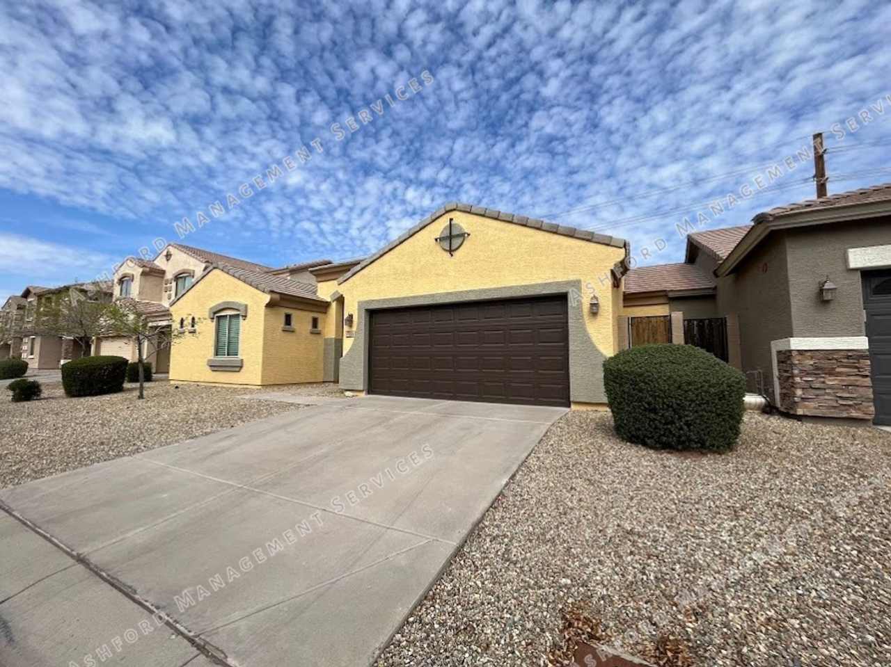 Well-Priced 3-Bedroom Plus Den in Gated Running Horse Community