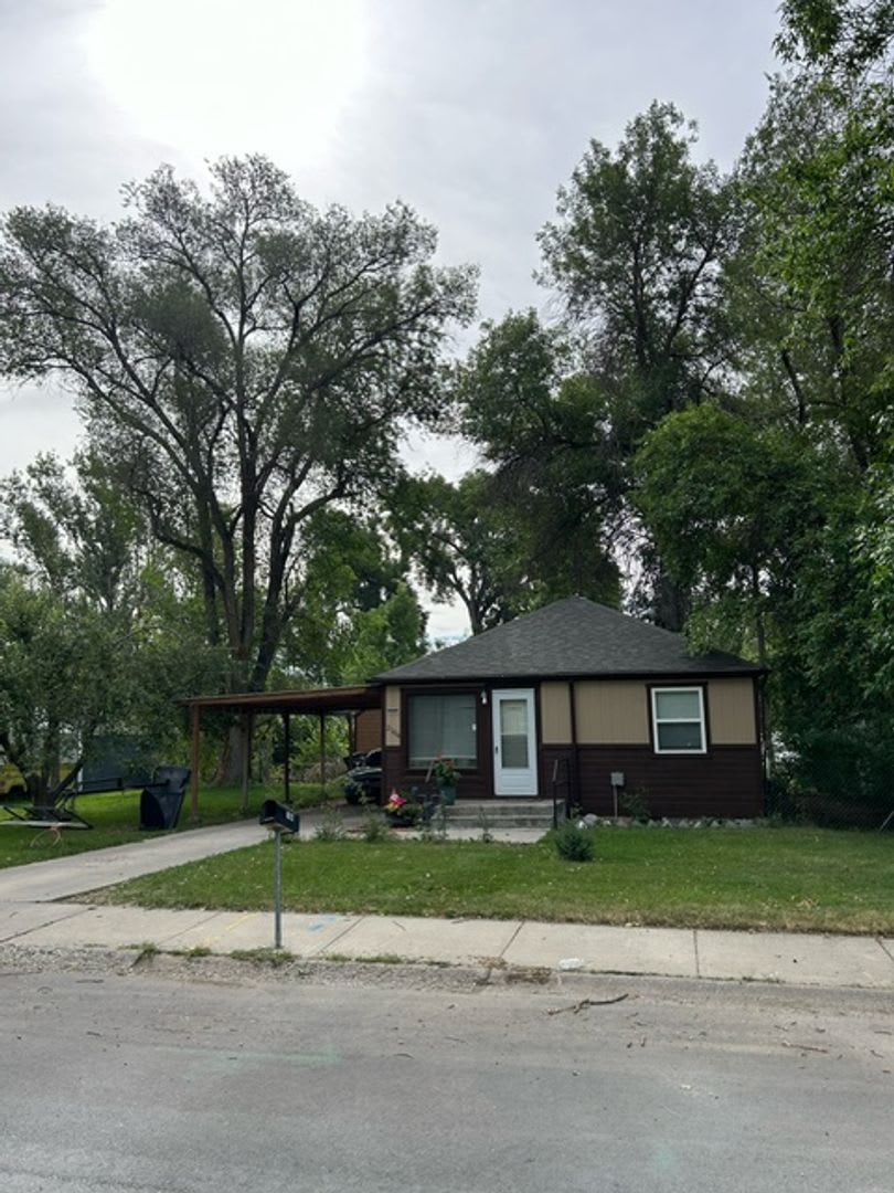 2 bedrooms, 1 bath on large lot with garage