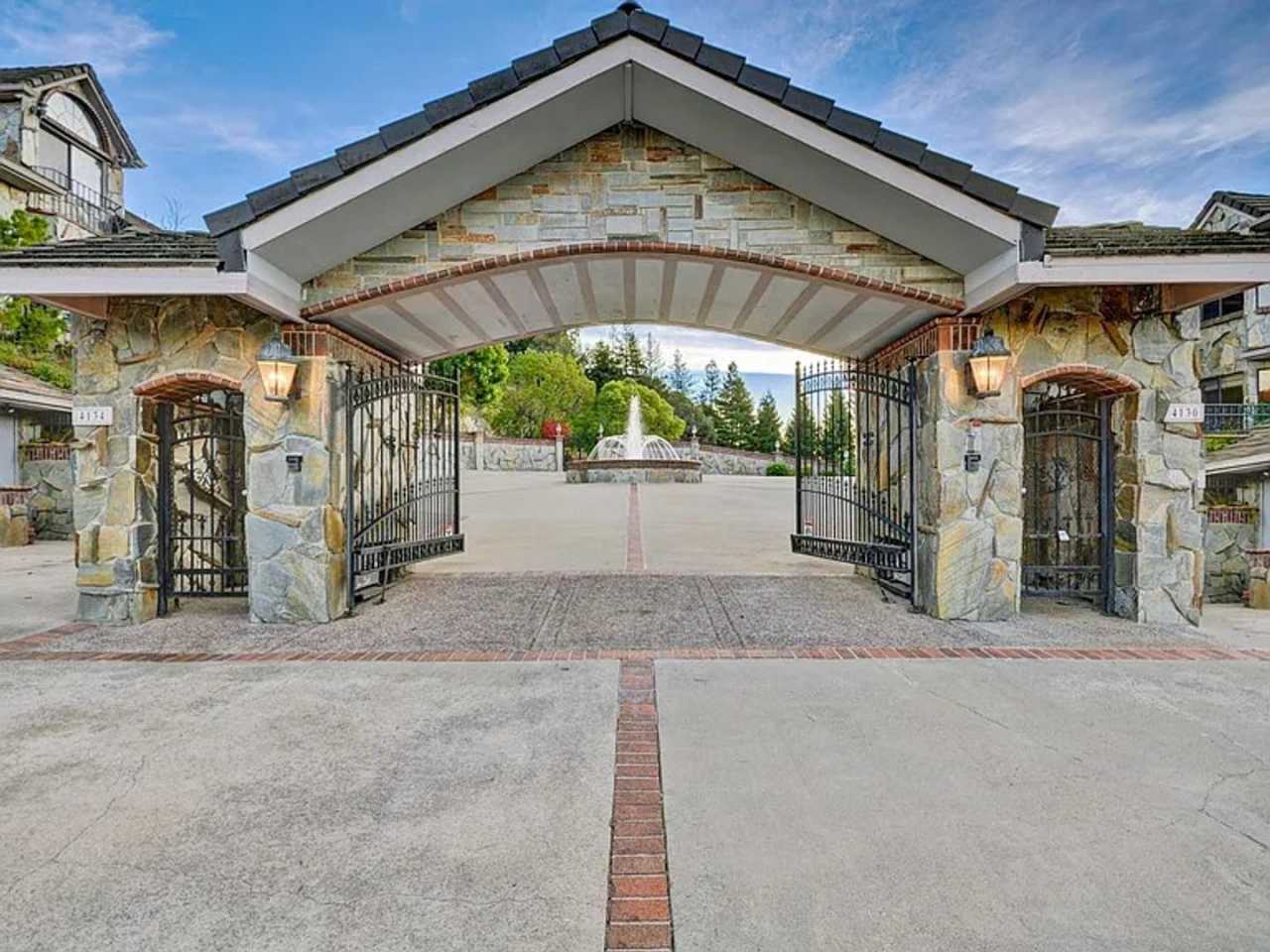 STUNNING LUXURY HOME WITH GORGEOUS SETTING IN WONDERFUL ORINDA!