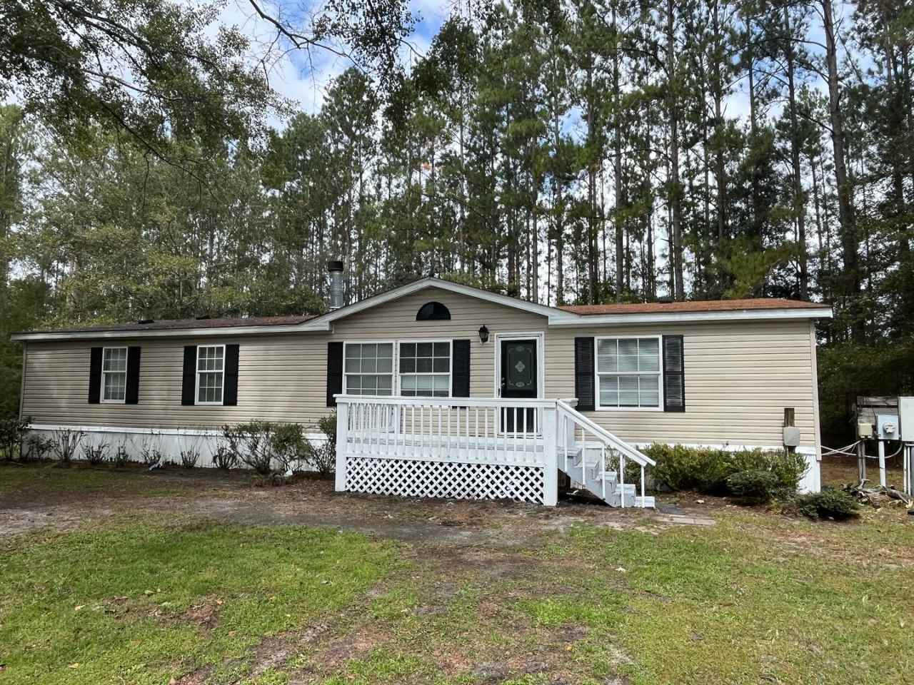 NO SECURITY DEPOSIT SPECIAL! Three Bedroom Home on 5 Acres in Guyton
