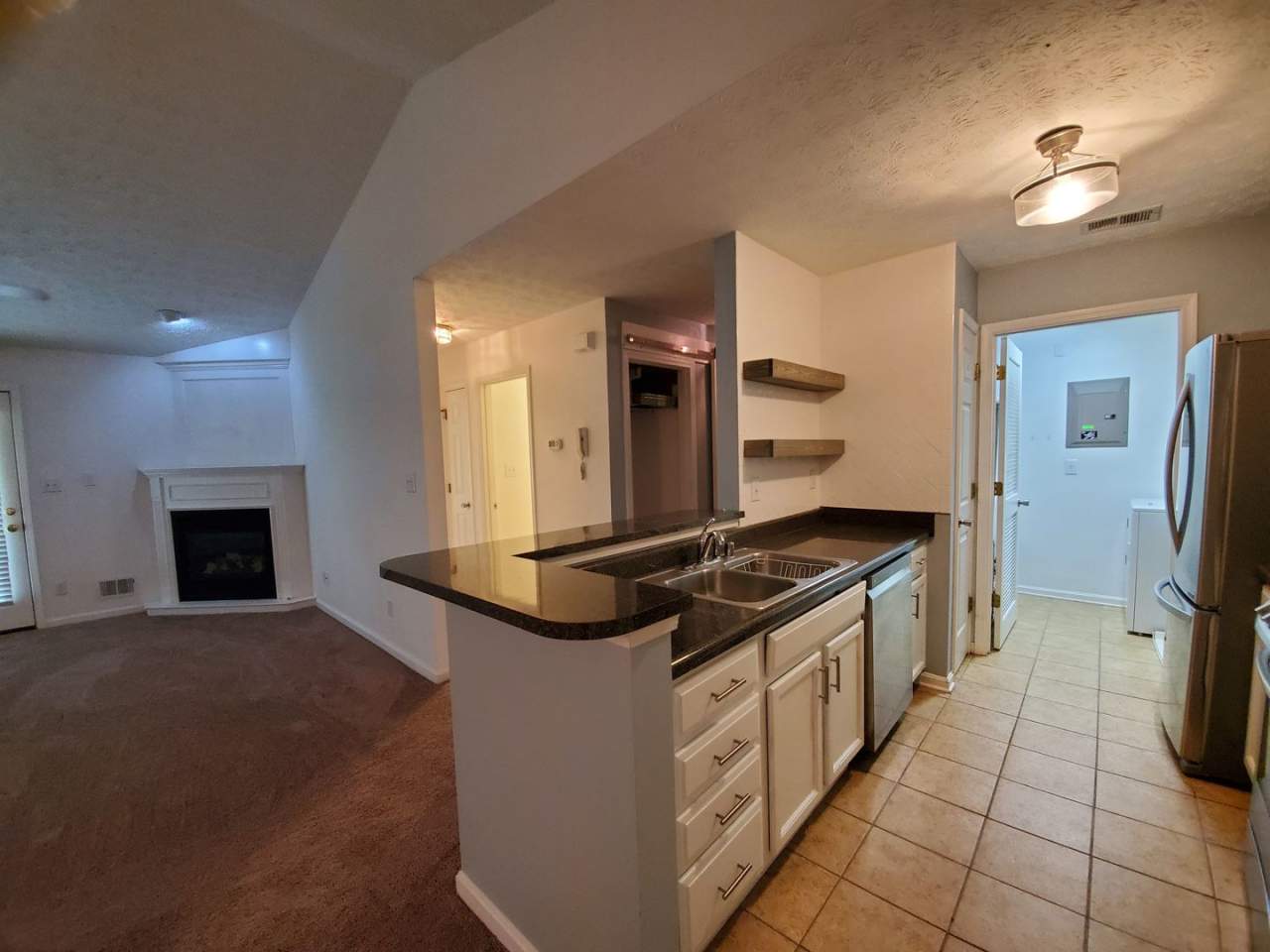 CHECK OUT THIS STUNNER!! Beautifully Updated, Spacious 2 Bedrooms, 2 Full Baths Storage Closet AND a 1 Car GARAGE! Second Floor, Ranch Style Condo in Lyndon with Covered Porch!