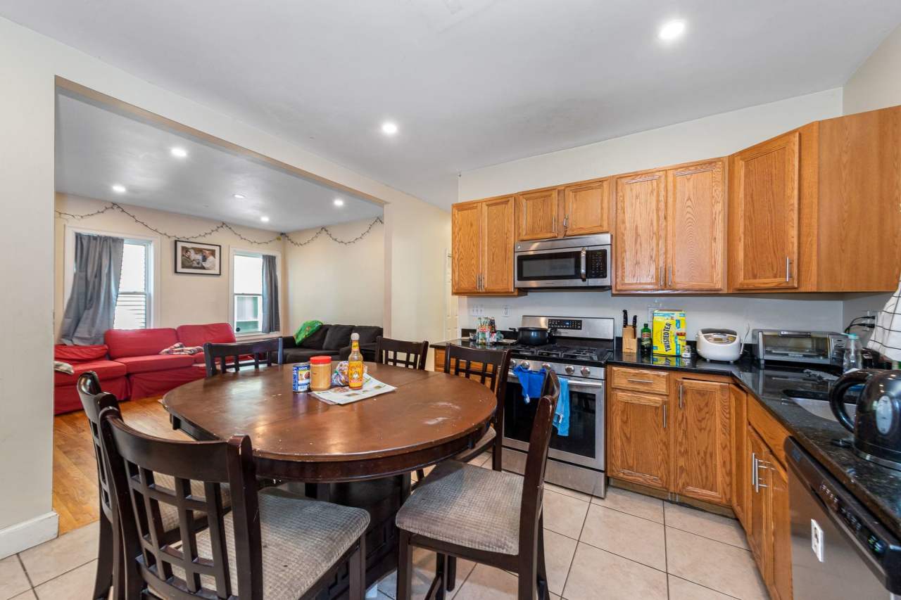 Fully renovated 5 bedroom unit on Mission Hill with a deck and shared backyard!