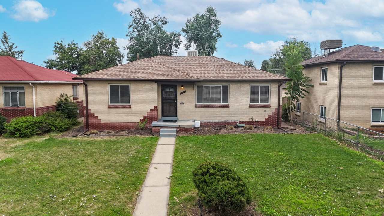 Spacious centrally located 4 bed/2 bath home w/2 car detached garage
