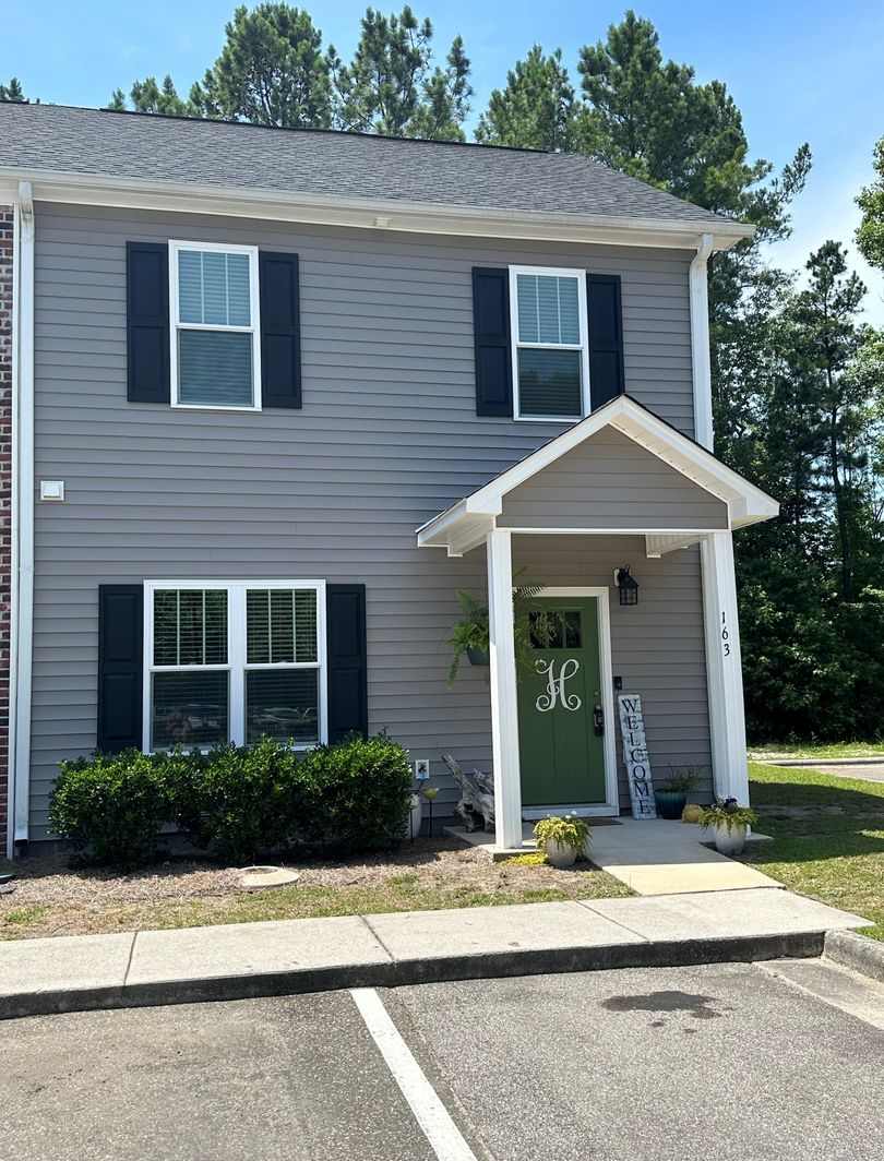 This spacious 3-bedroom, 2-bathroom townhouse offers modern living