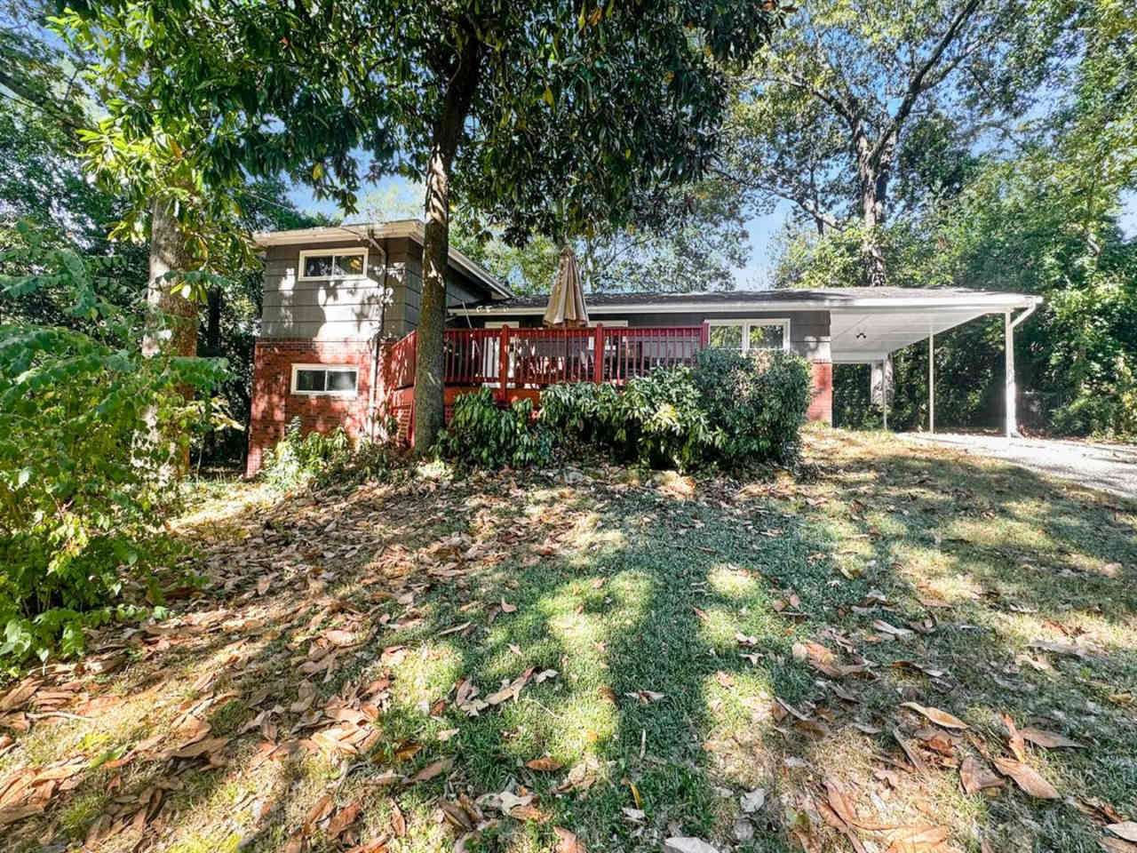 Charming 4BR 2BA w/ Covered Carport • In-Unit Laundry • Front Deck in Chamblee