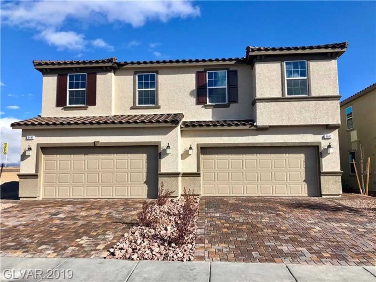 Beautiful Townhome in a Gated Community with 2-Car Garage!!