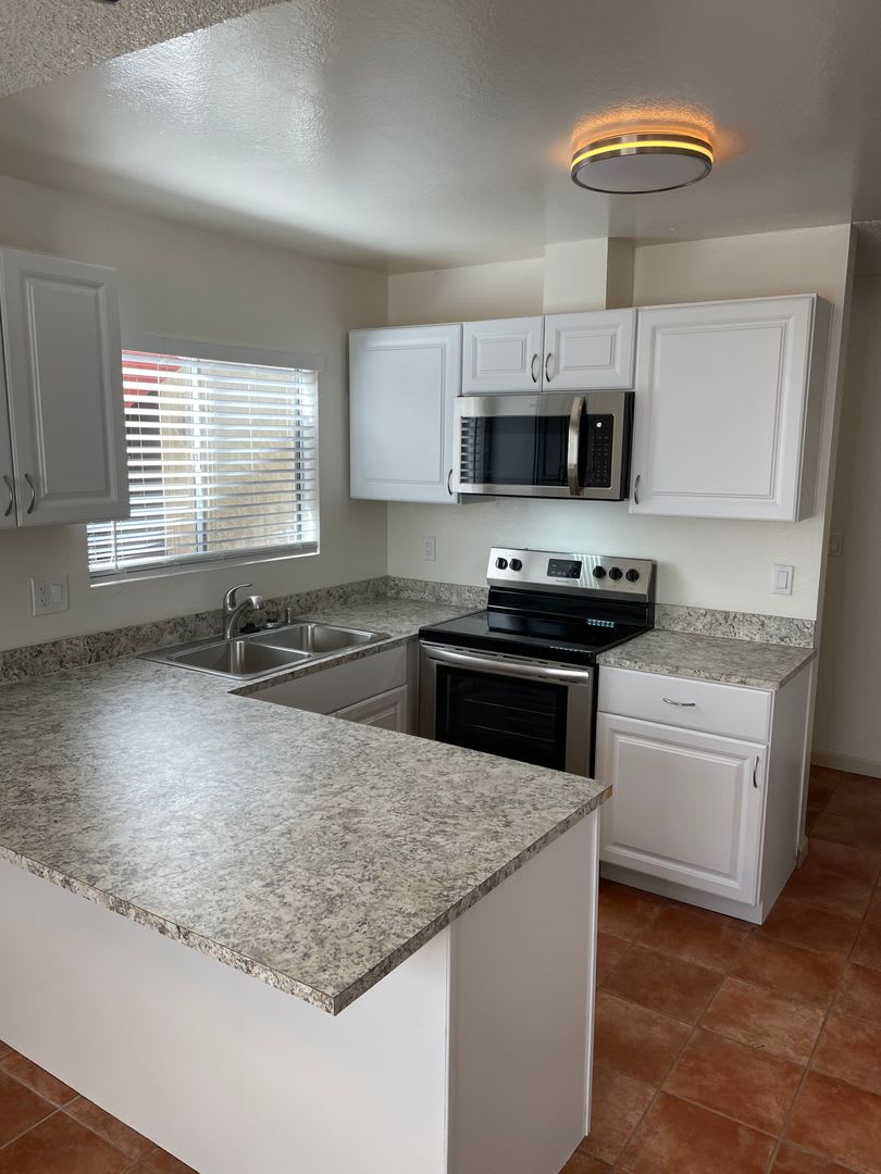 Bright and Charming 3 Bedroom 2 Bath Condo with Patio and A/C!