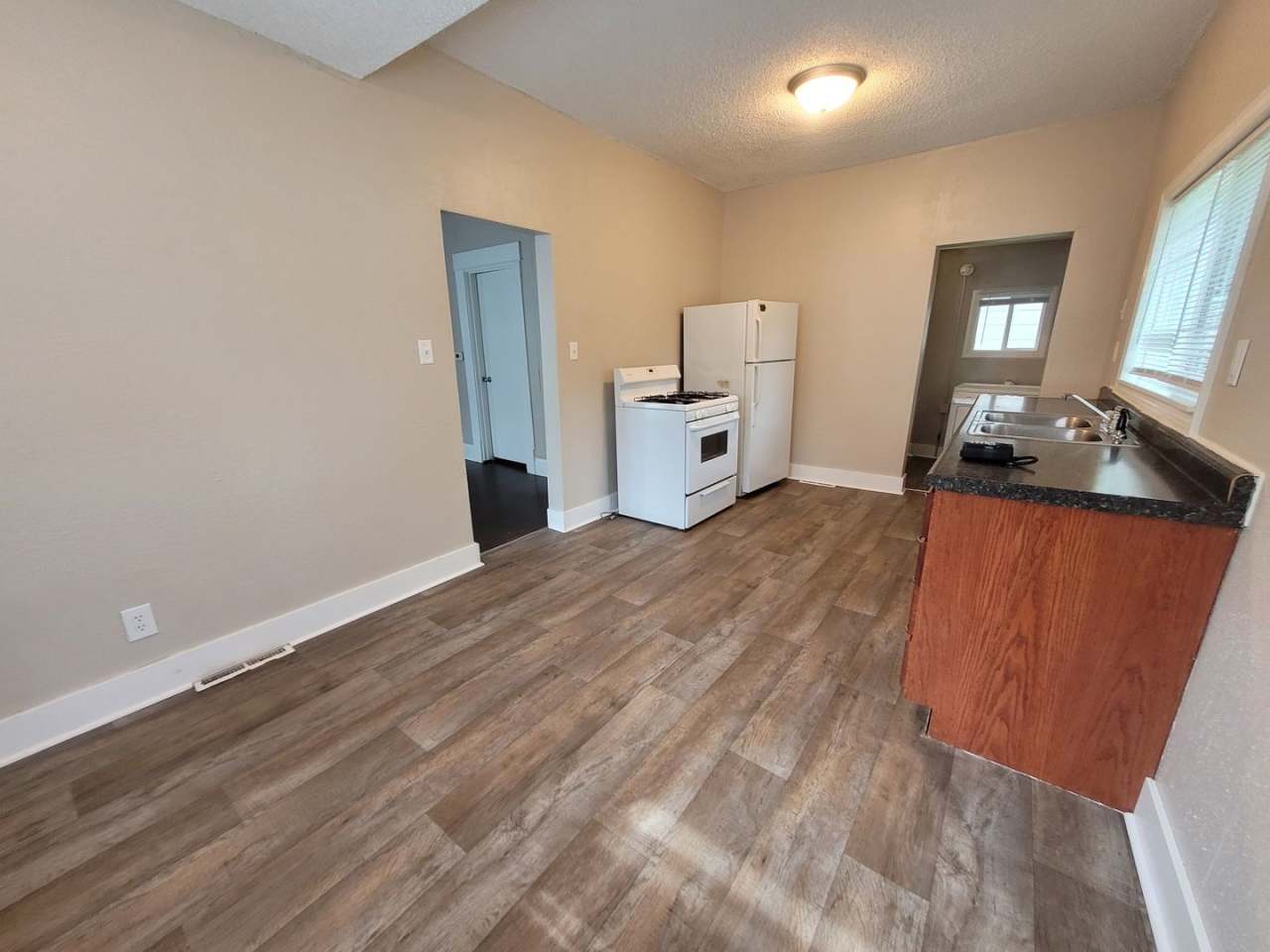 Two bedroom home with partially fenced yard!