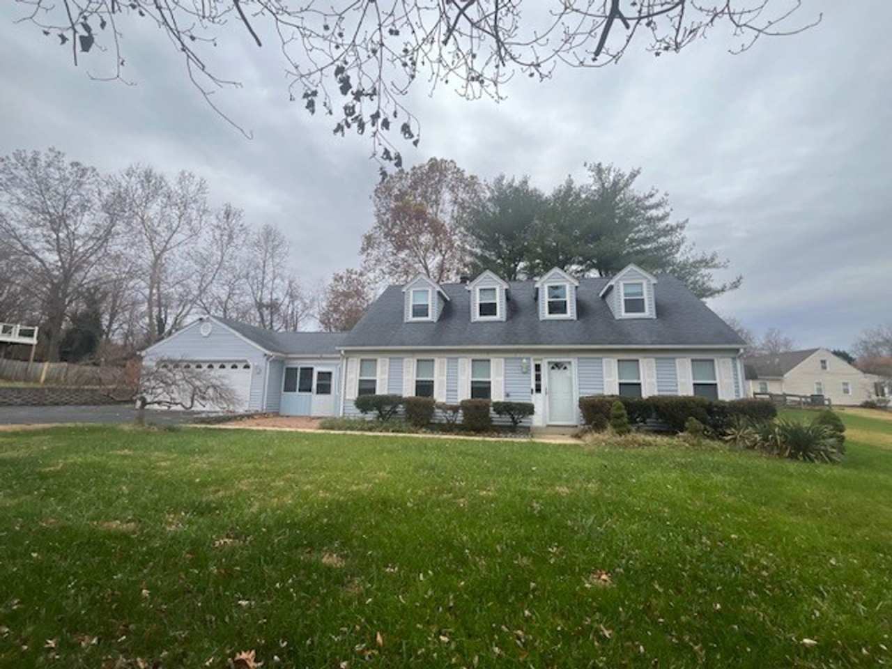LOVELY CAPE COD WITH 4 BEDS, 2 BATHS AND GARAGE