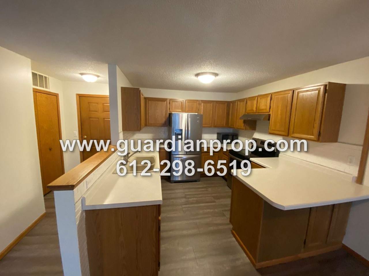 Top Floor Condo Available May 1st, Open Floor Plan, 3 Season Porch, Walk-in Closet, 2 Baths, Garage Included