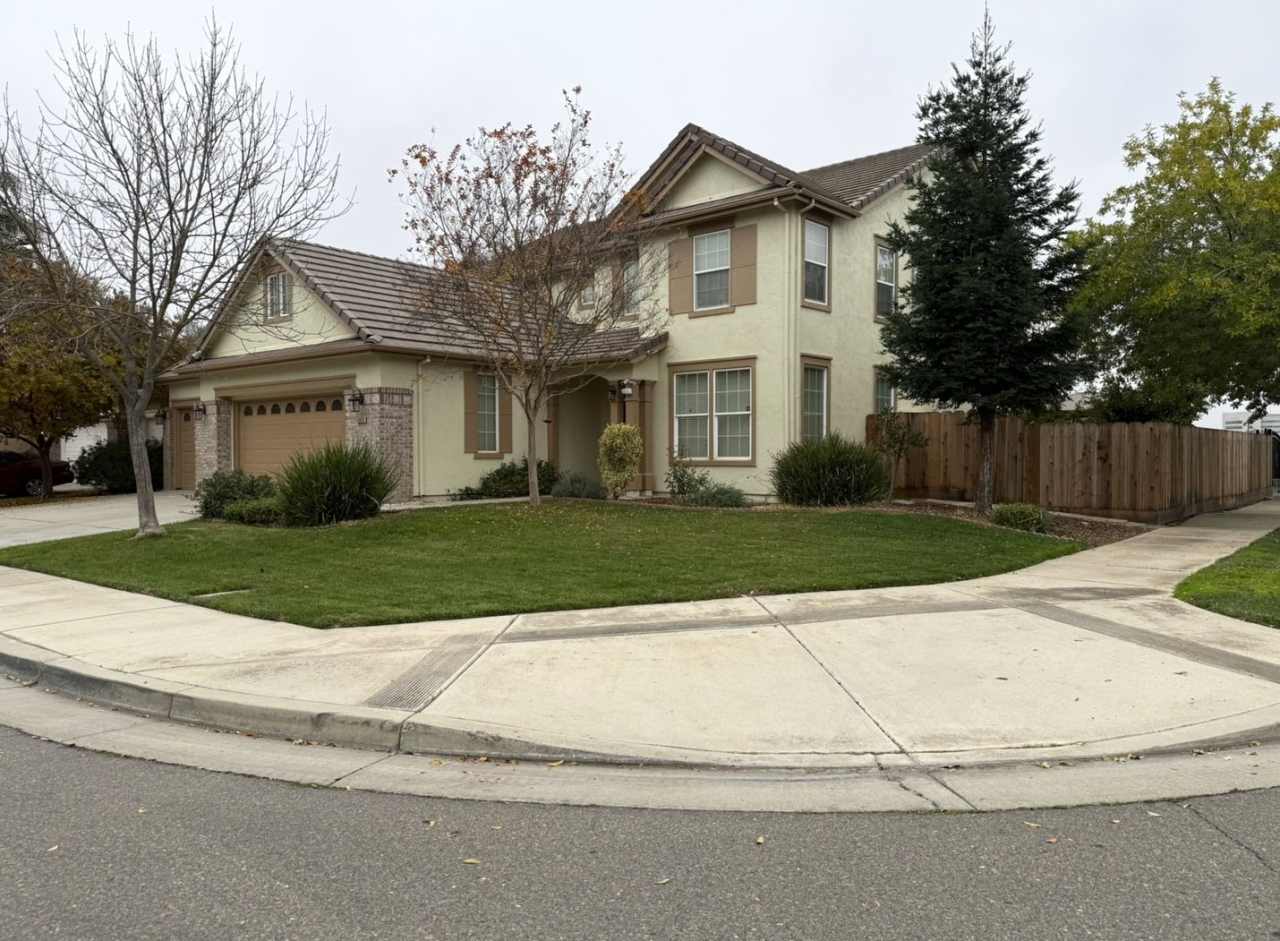 Lovely 5/3 with a desirable downstairs bedroom.