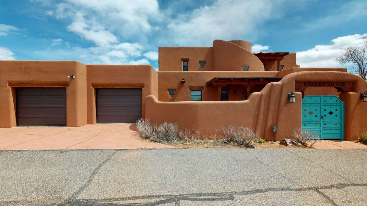 Custom Adobe style home in exclusive Navajo Ridge