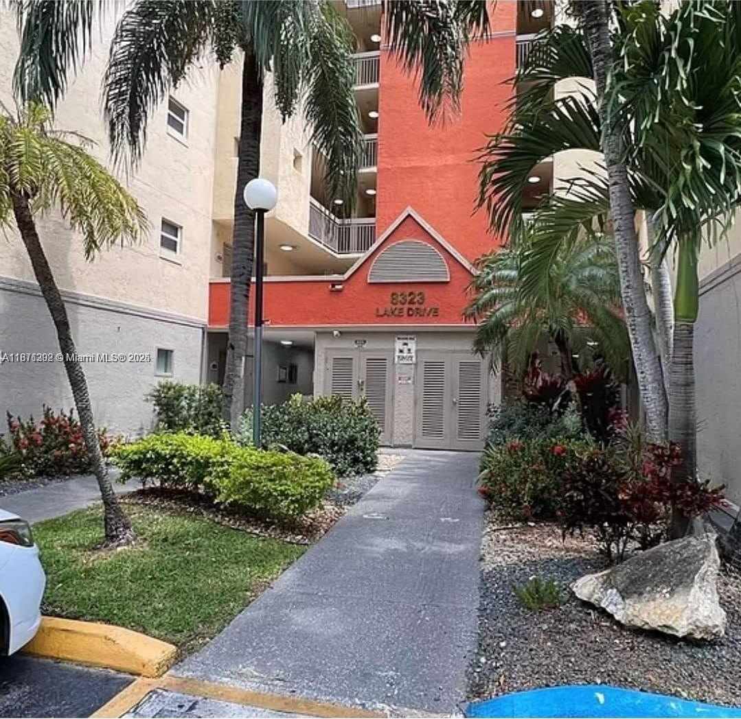 8323 NW LAKE DR.