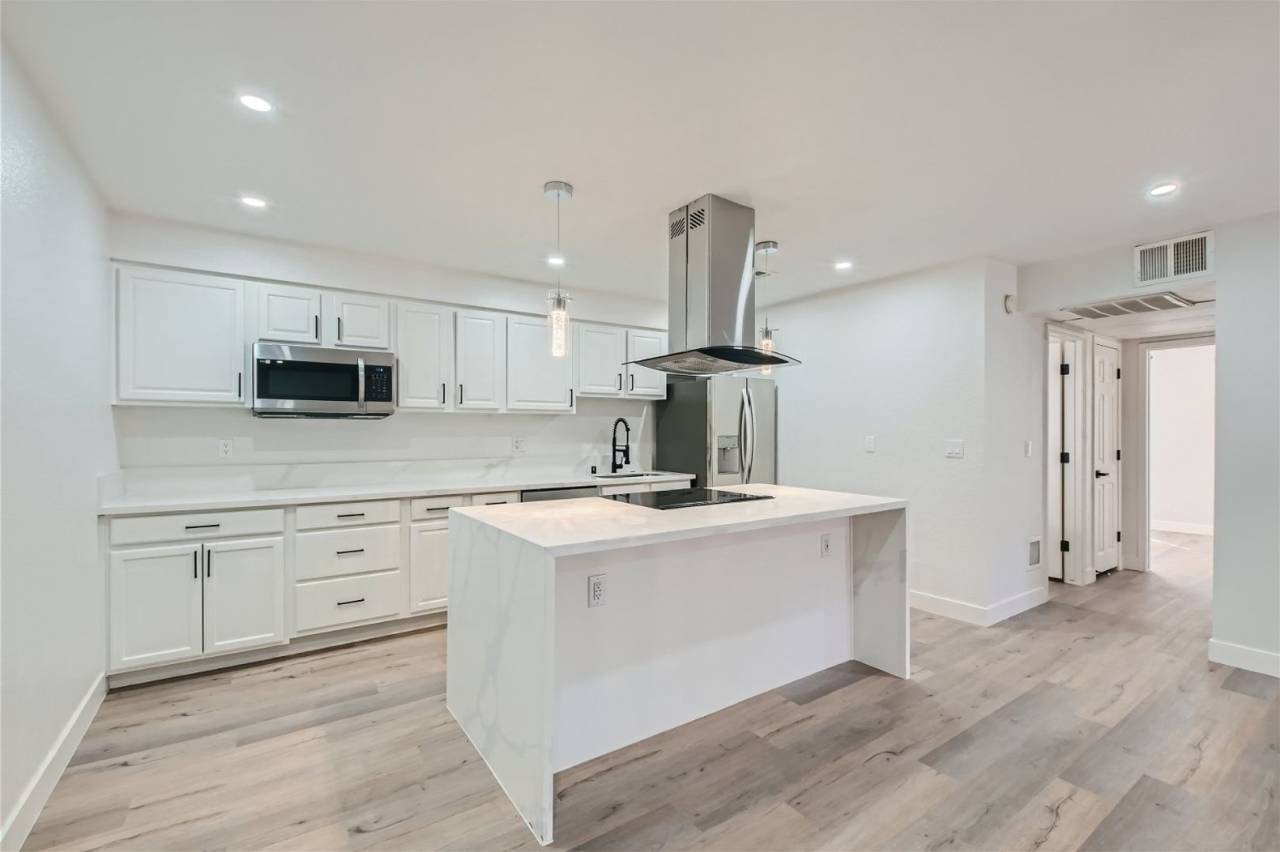 QUALITY DESIGNER Remodeled Condo in a Guard Gated Community!