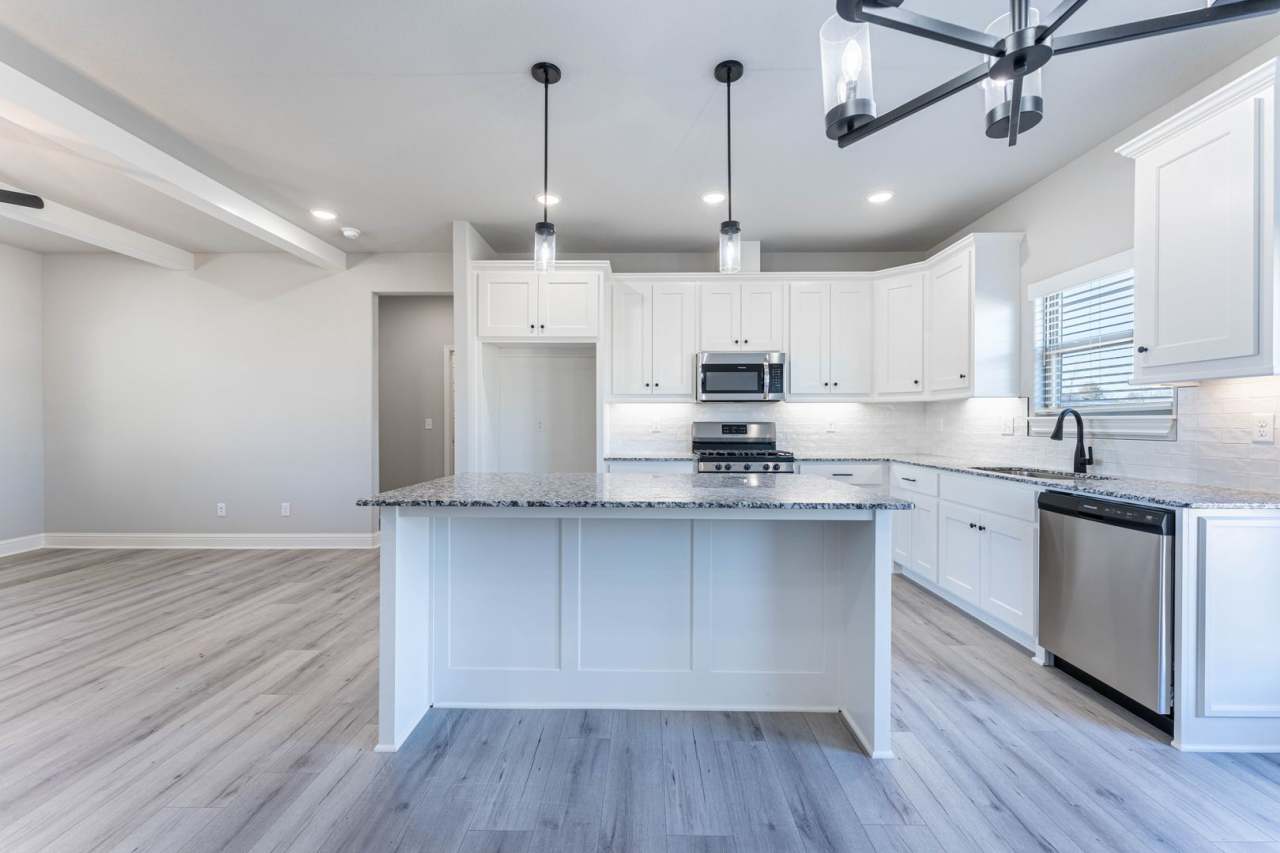 This cute 3 bed 2 bath newer build is waiting for you