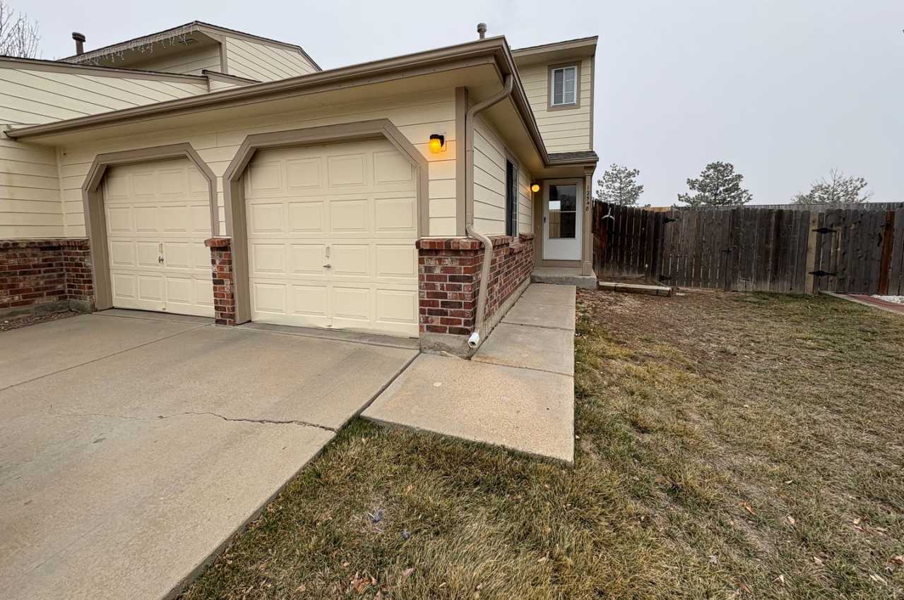 Nice Thornton Duplex with Oversized Attached Garage