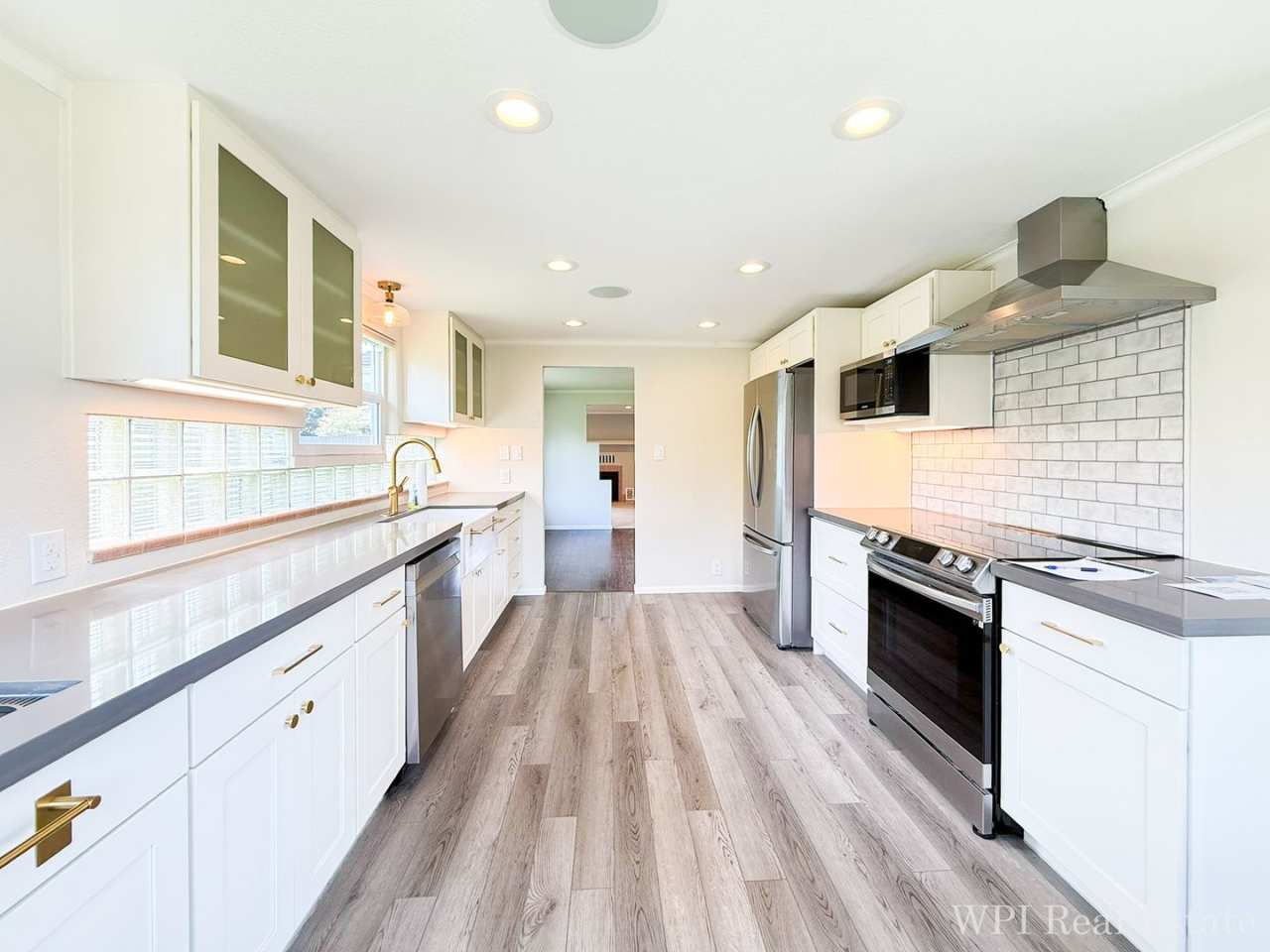 Beautiful recently remodeled 4 bed 2 bath home. Perfect for multi generational living with second kitchen in basement!