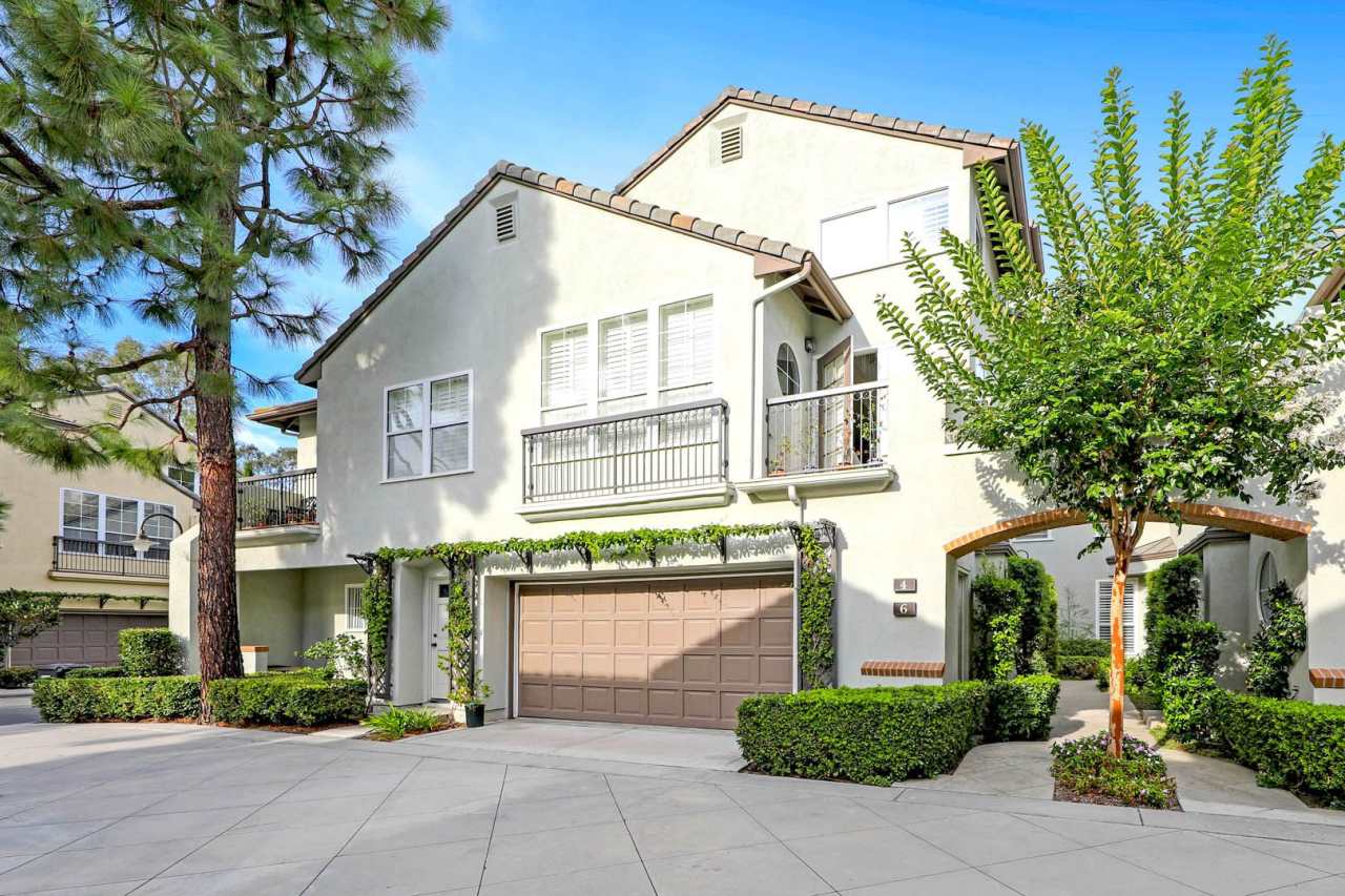 Gorgeous interior tract townhouse in the desirable gated Summit community