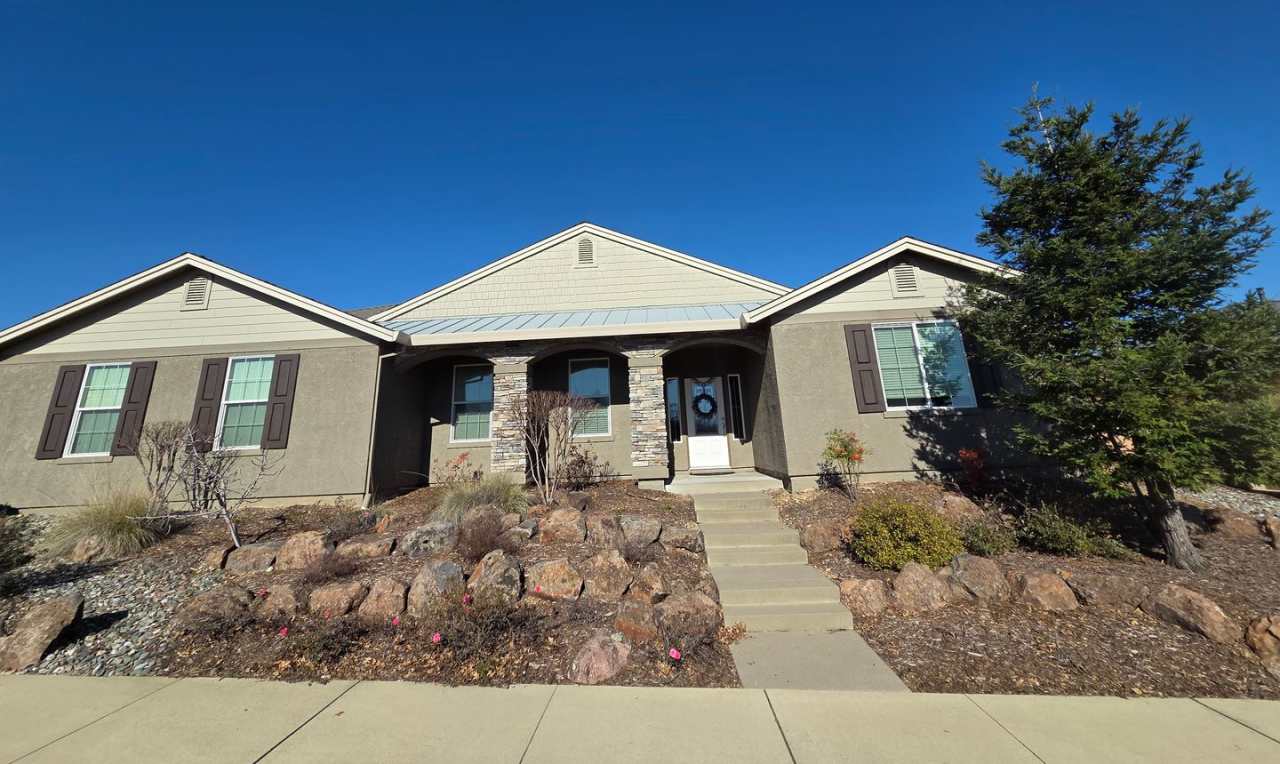 Home in Highland Park neighborhood with 3 car garage.