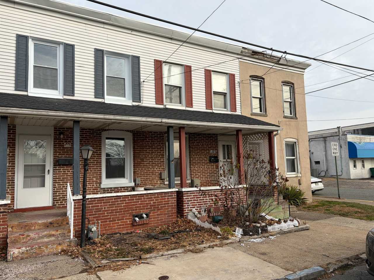 Newly Renovated 2- Story Townhome with Front Porch and Back Yard