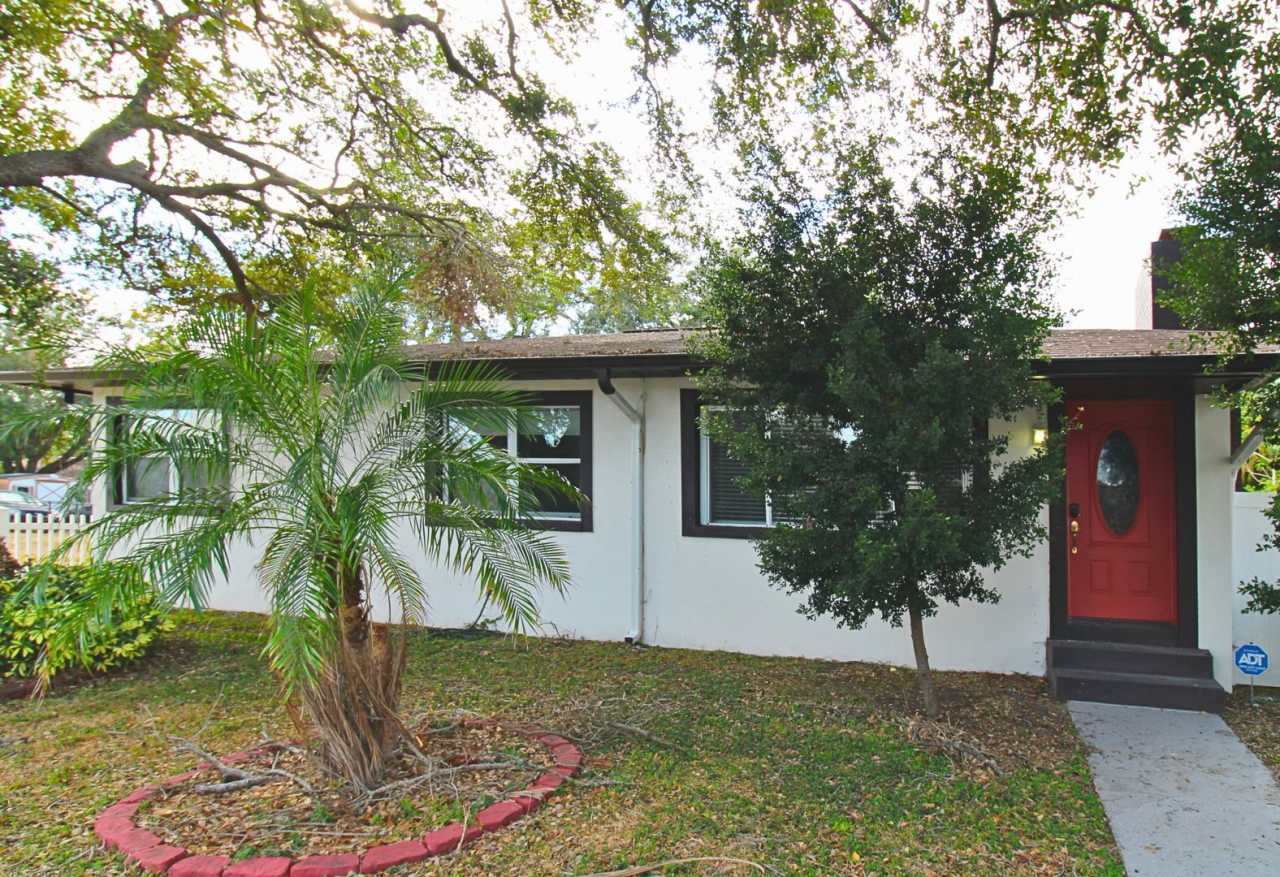 Charming Renovated Tampa Home with Fully Fenced Front  Backyard