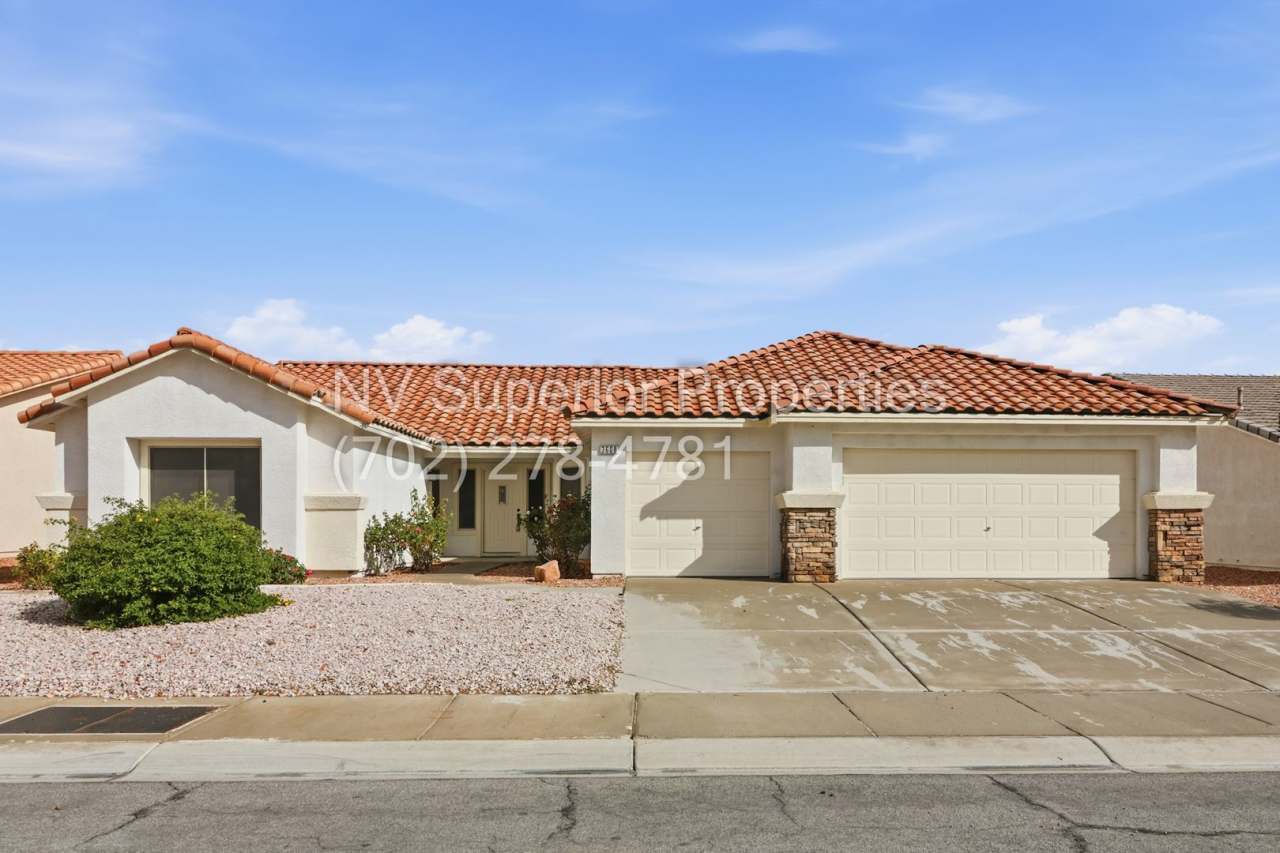 NW!! Single Story!!! 3 Car Garage!! 2 Masters!!! Low Maintenance desert landscape front yard!! Covered Patio in back yard!! No Carpet!!!!