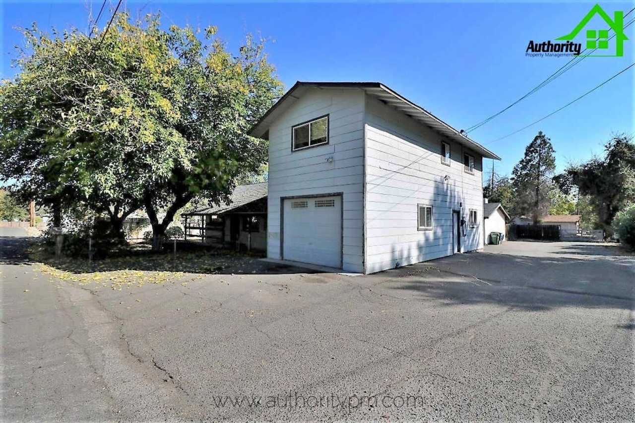 5365 Rosswood St. - Spacious and Fully Fenced | Single-Car Garage