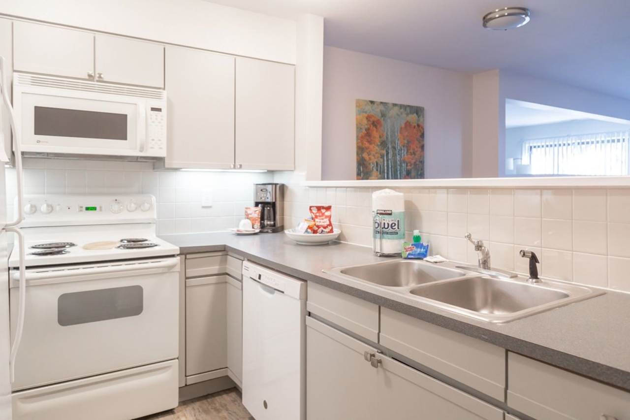 Condo in Downtown Boulder Furnished One bedroom with Den and large Patio looking out to Flatirons