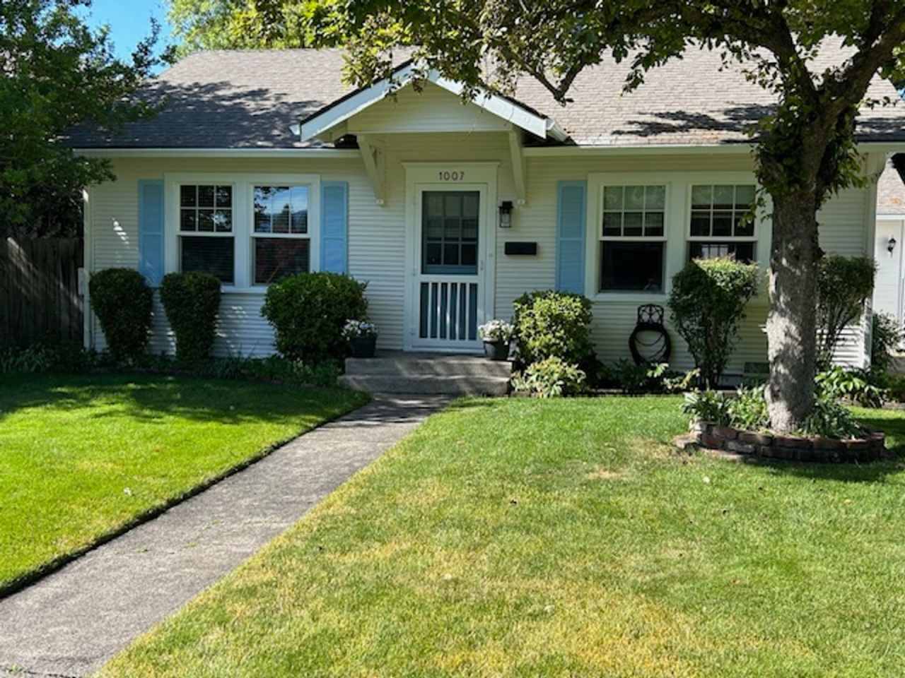 Charming 2 bedroom, 1 bathroom, single story cottage w/oversized garage