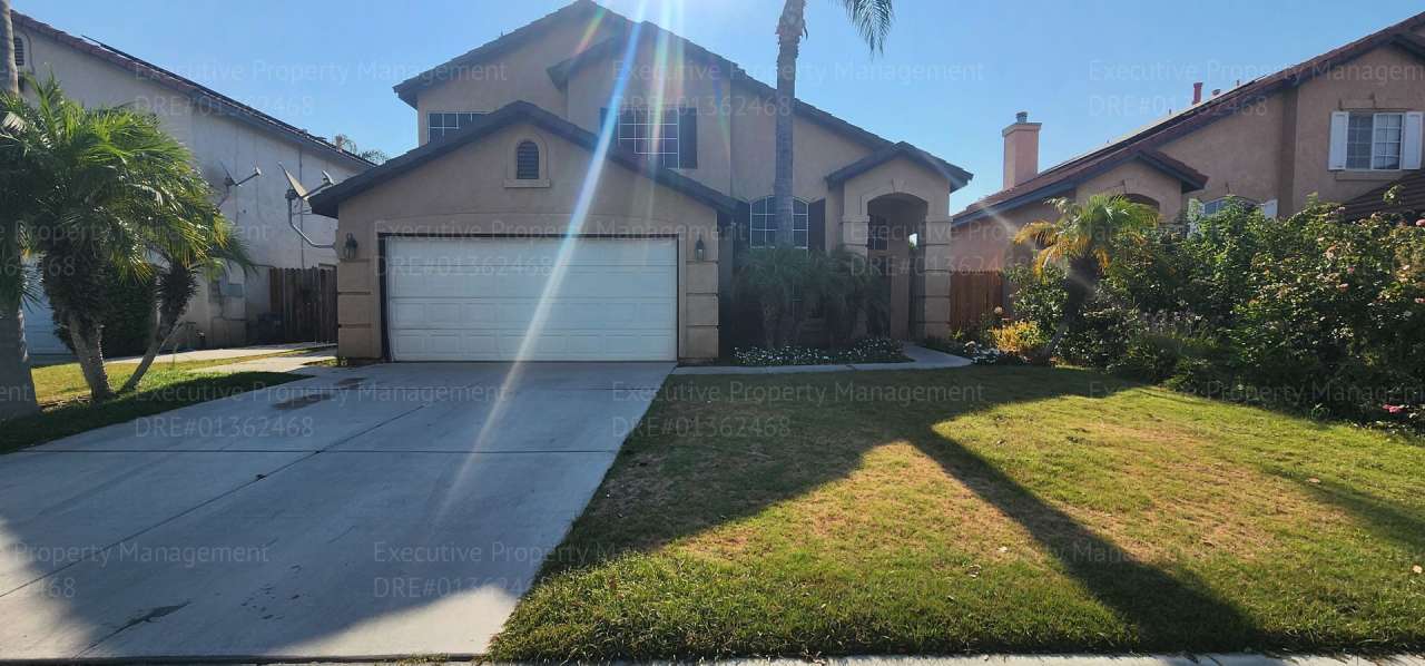 2 story home with 4 bedrooms, 2.5 bathrooms, and a pool.