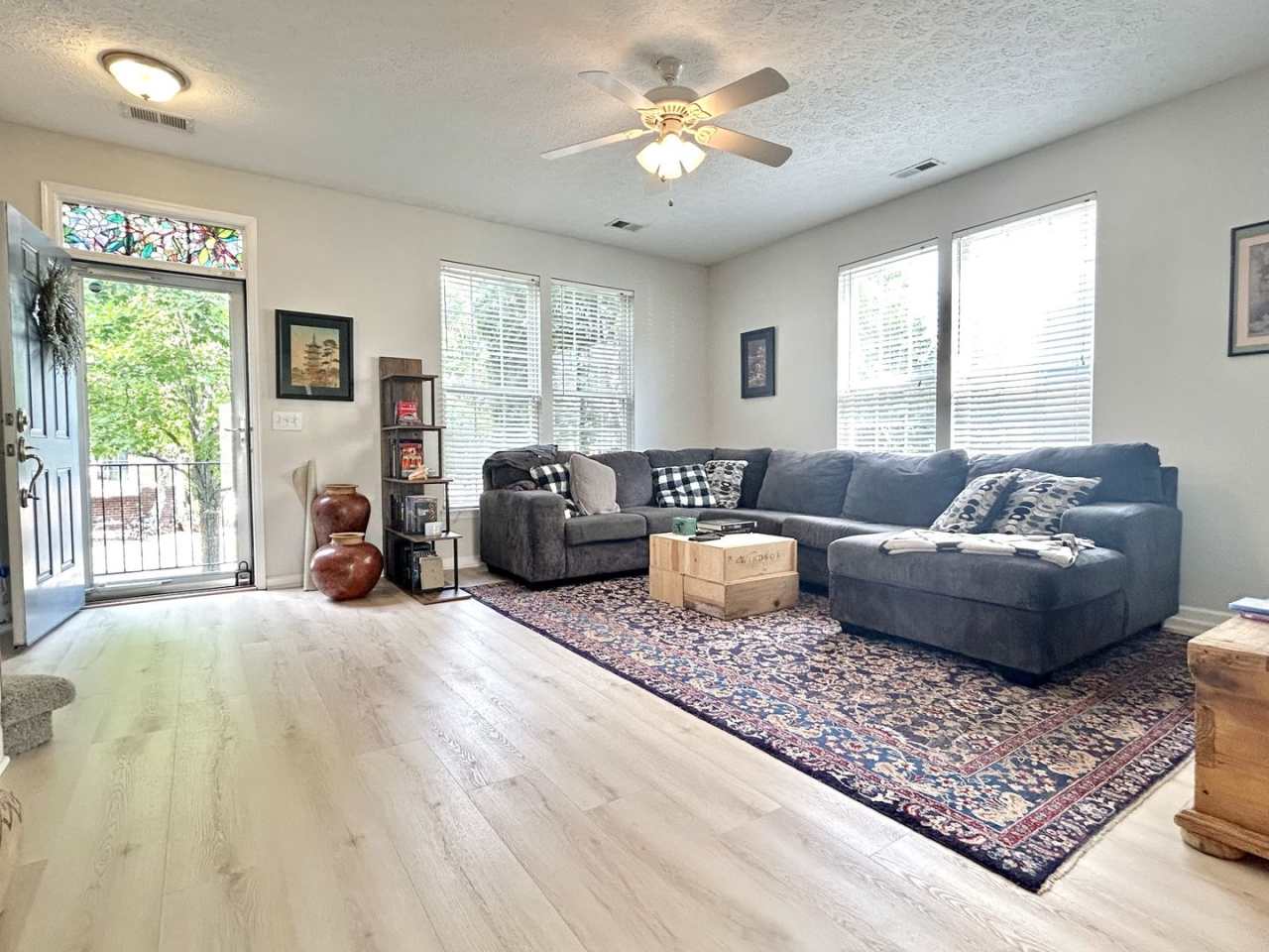 **UPDATED END-UNIT LENOX VILLAGE TOWNHOME WITH COVERED CARPORT PARKING FOR TWO VEHICLES**