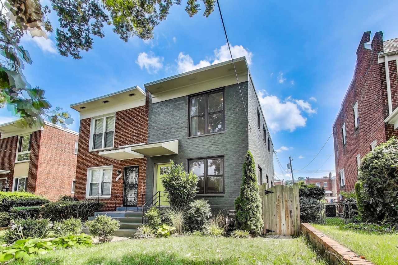 Welcome to this fully renovated, contemporary row home nestled in Michigan Park!