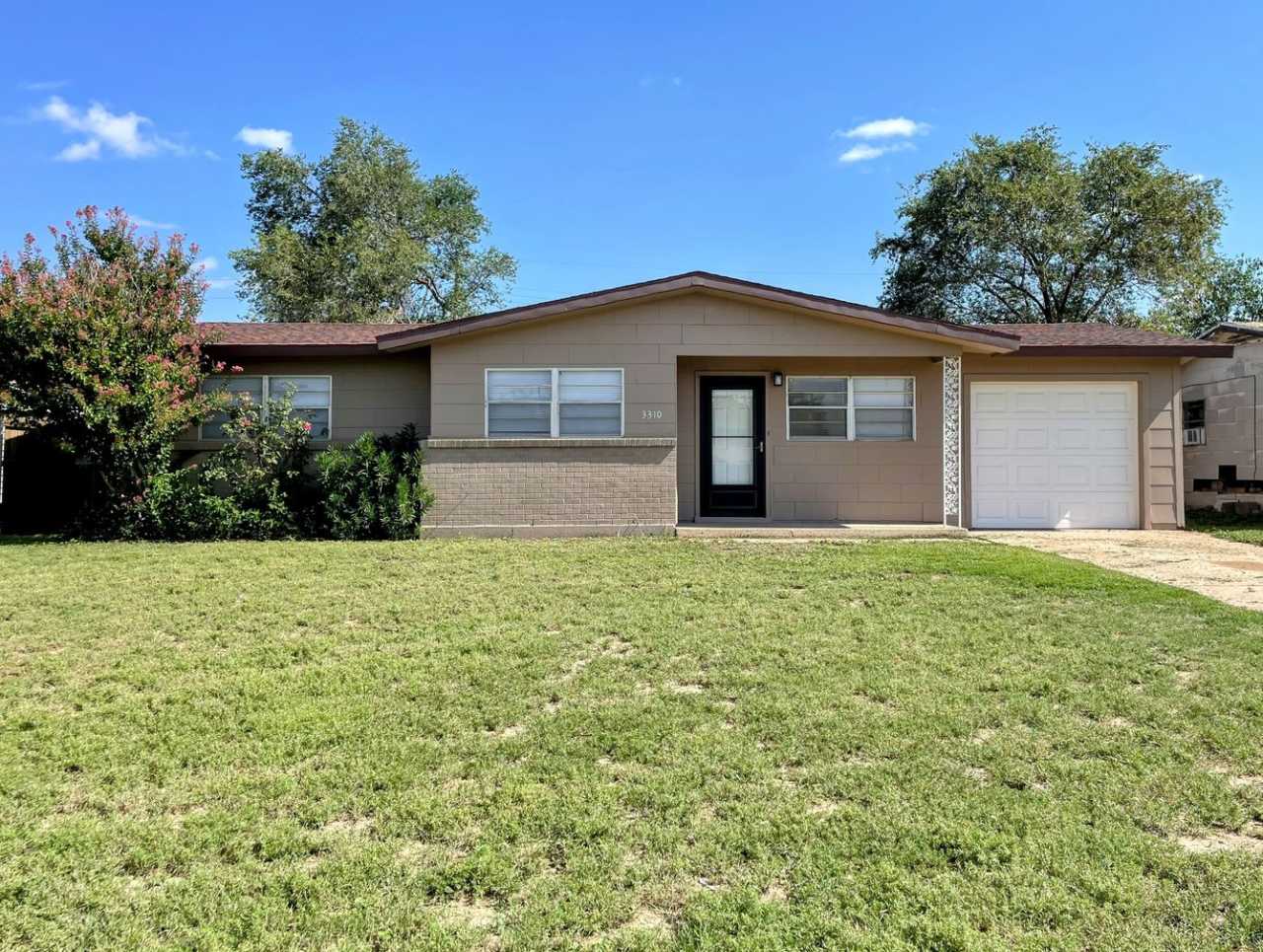 Newly renovated 3/1 with fenced back yard and storage building