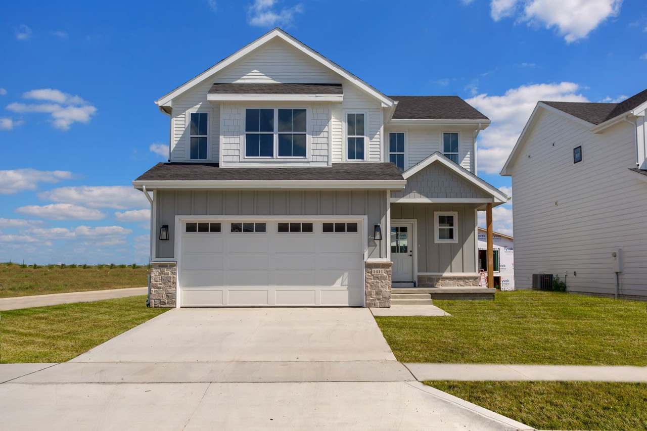 Spacious 4-Bedroom Home with 2-Car Garage  Yard