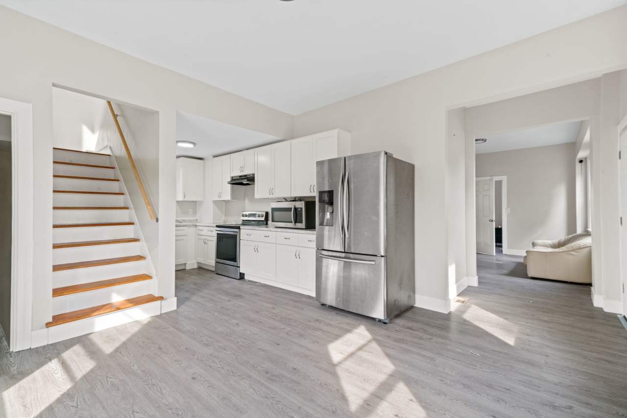 Spacious 3-Bedroom Home with Sunroom  Off-Street Parking in Johnston!